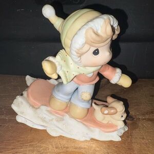 Porcelain Winter Child Figurine. “There’s Sno-Boredom With You”. Precious Moment